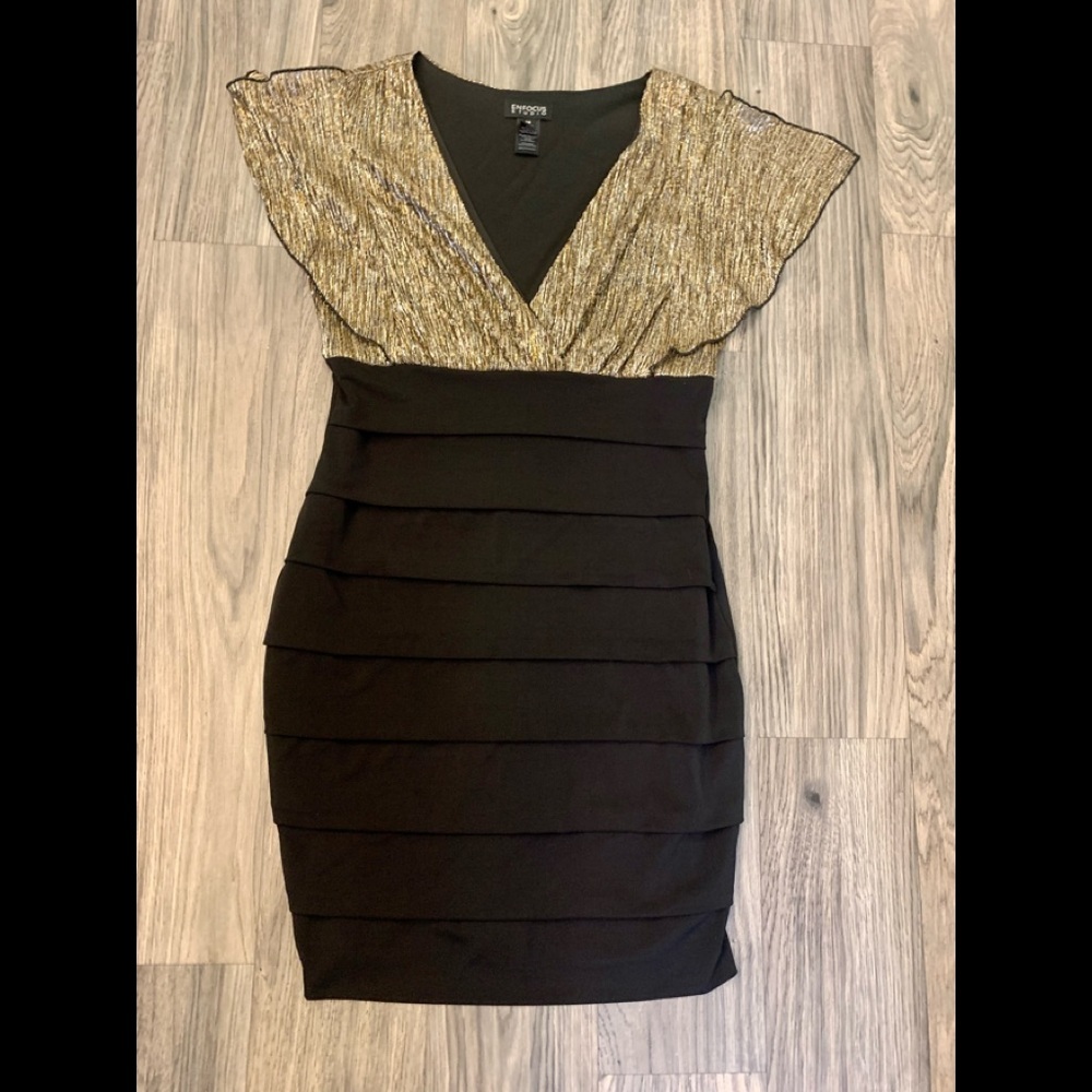Size 14 shimmery gold and black dress. Perfect condition. Flattering fit!